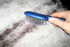 расчесывание меха после стирки